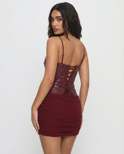 VESTIDO MINI CON LENTEJUELAS Y ESPALDA CORSET